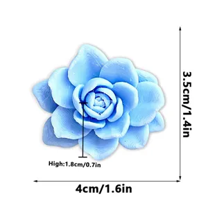 Close-up detail of 3D printed blue succulent flower fridge magnet, showing clear texture and size.
