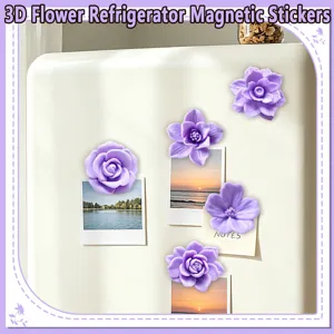 Detailed shot of 3D purple flower refrigerator magnets attached to a white fridge door.