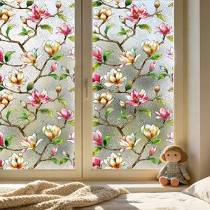 Película decorativa para ventana con hermoso diseño de ramas de magnolia efecto agua.
