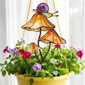 Piquet de jardin champignon et escargot en métal, décoration florale colorée.