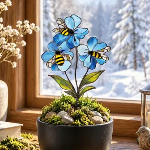 Metal stained glass flower garden stake with bees in a moss potted decor for outdoor yard.