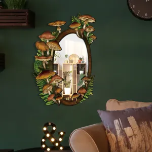 Bohemian wooden wall mirror with mushroom and fern leaf decor, boho aesthetic room decor.