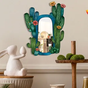 Boho style cactus shaped decorative wooden mirror detail, unique plant wall art for home decor.