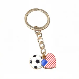 Alloy soccer and US flag heart keychain pendant, stylish and durable DIY jewelry accessory.