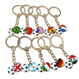 Detailed view of alloy heart-shaped national flag and soccer ball enamel keychain charms with 25mm ring.