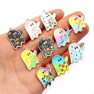 Close-up detail of cute Halloween ghost enamel charms, featuring various colorful patterns.
