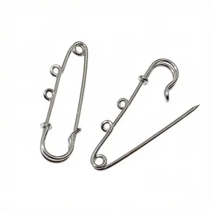 Stainless steel safety pin detail showing three small welded loops for DIY brooch jewelry making