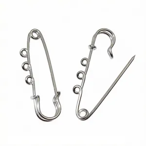 Stainless steel safety brooch pins with small hanging loops for DIY jewelry making and crafts.