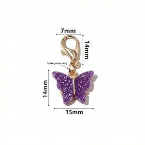 Purple acrylic butterfly pendant charm with lobster clasp and jump ring for DIY jewelry making.