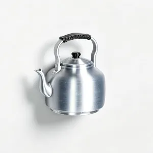 Close-up detail of the retro kettle shaped 3d magnetic fridge sticker with realistic texture.