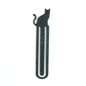Schwarzes Metall Katzen Lesezeichen mit strukturierter Oberflaeche, stilvolles Geschenk.