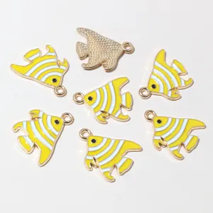 Close-up detail of alloy drop oil striped sea fish charms, ideal for DIY jewelry making.