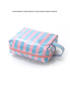 Pink and blue striped cosmetic bag with zipper and handle for travel and daily use.