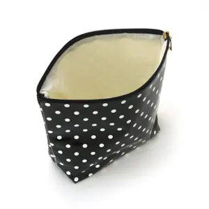 Glossy black and white polka dot cosmetic bag, portable zipper makeup pouch for travel.