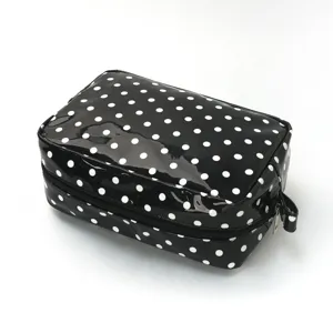 Black and white polka dot cosmetic bag, waterproof travel makeup pouch with zipper.