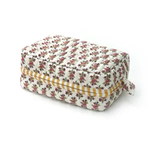 Quilted floral cosmetic bag, portable travel makeup pouch, large capacity storage organizer.