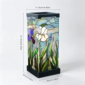 Luce notturna in vetro colorato con motivo a iris e base nera per decorazione da comodino.