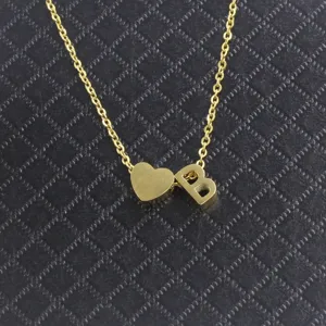 Stainless steel gold heart letter B pendant necklace detail shot, fashion couple jewelry charm.
