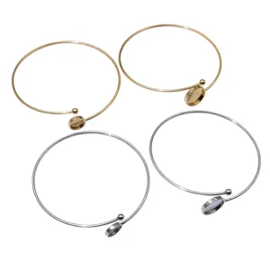 Closeup of stainless steel blank tray cuff bracelets, DIY open bangle jewelry findings.