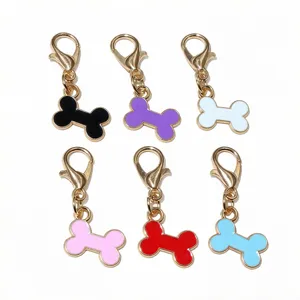Colorful bone shaped enamel charms with lobster clasps for DIY jewelry making and crafts.