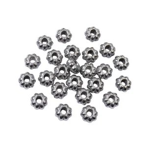 Stainless steel pumpkin spacer beads detail shot, perfect for DIY jewelry making and crafting.