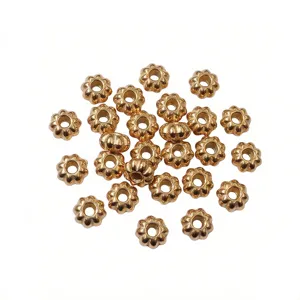 Gold stainless steel pumpkin spacer beads for DIY jewelry making and craft supplies.