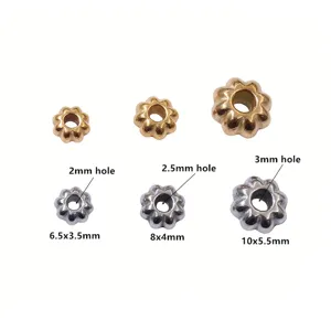 Stainless steel pumpkin spacer beads detail view showing various sizes and hole dimensions.