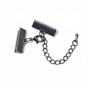 Detailed view of DIY jewelry findings including lobster clasp, extender chain and cord ends.