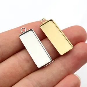 Stainless steel rectangular pendant bezel tray blank detail view, 10x25mm inner size.