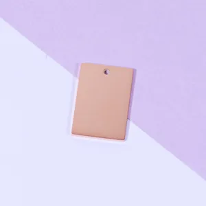 Stainless steel rectangle pendant detail shot, smooth laser engraving DIY jewelry blank.