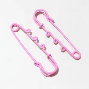 Pink decorative metal safety pins with multiple hanging loops for doll pendants and DIY crafts