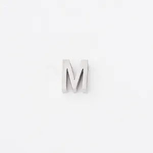 Stainless steel letter M pendant charm for DIY jewelry making and accessories design.