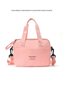 Pink insulated lunch bag with shoulder strap, portable waterproof food container tote.