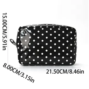 Black and white polka dot cosmetic bag, waterproof large capacity travel storage pouch.