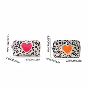Leopard print waterproof travel cosmetic bag with heart pattern, portable makeup storage organizer.