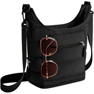 Black quilted nylon crossbody shoulder bag with zipper pocket and adjustable strap for women.