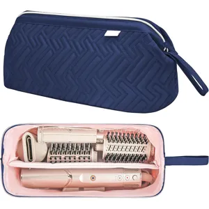 Vista dettagliata della borsa da viaggio multi-scomparto per strumenti per lo styling dei capelli.