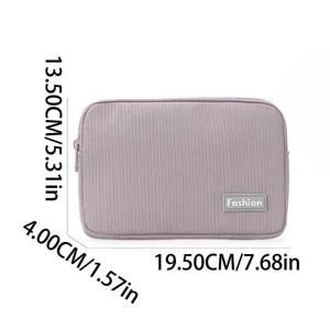 Portable cosmetic storage bag with ribbed design, durable zipper pouch for travel and daily use.