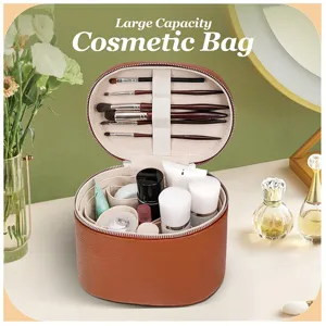 Large capacity PU leather cosmetic bag with brush holders and multi-functional compartments.