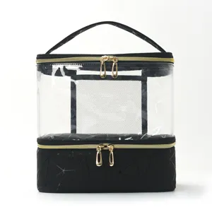 Bolsa de maquillaje transparente de PVC de doble capa con cremalleras doradas y diseño.