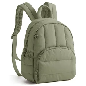 Green quilted backpack detail view, casual everyday daypack featuring front zip pocket