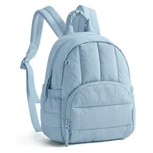 Light blue quilted backpack detail view, casual women commuter bag, stylish everyday daypack.