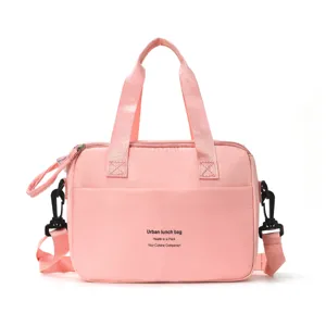 Pink insulated lunch bag for women, waterproof portable cooler tote bag with shoulder strap.