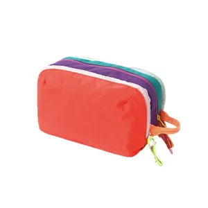 Multi-layer color-blocking cosmetic bag large capacity portable travel toiletry pouch for women.