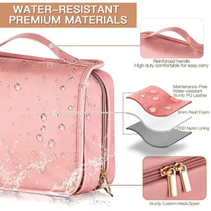 Pink PU leather travel cosmetic bag with waterproof material, reinforced handle and durable zippers.