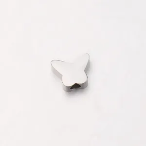 Stainless steel butterfly small hole bead detail shot, polished mirror finish diy accessory.