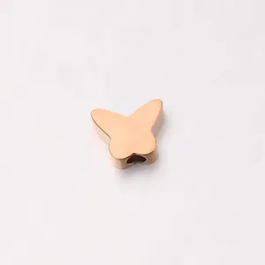 Stainless steel butterfly hole bead detail close up shot showing polished rose gold surface