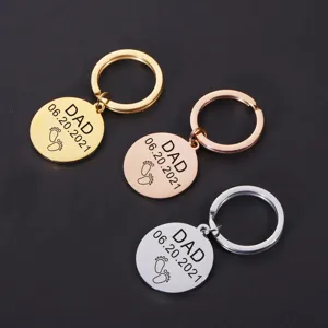 Stainless steel dad keychain engraved round pendant custom father day gift accessory.