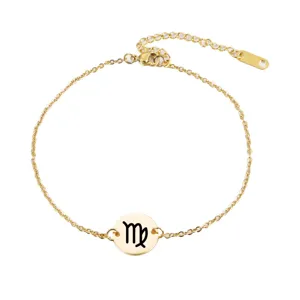 Gold stainless steel Virgo zodiac charm bracelet, minimalist coin pendant jewelry detail.