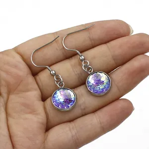 Stainless steel hook earrings featuring purple resin fish scale cabochons for women jewelry.